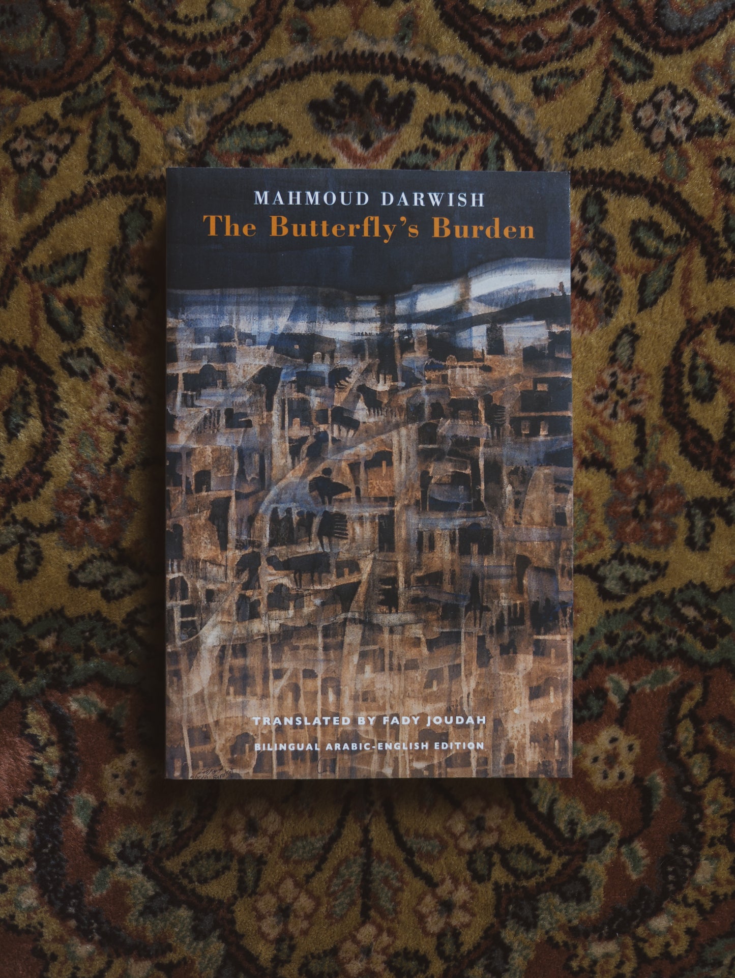 The Butterfly's Burden (Arabic and English Edition)